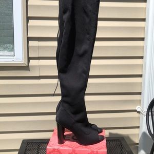 Thigh high open toed heels